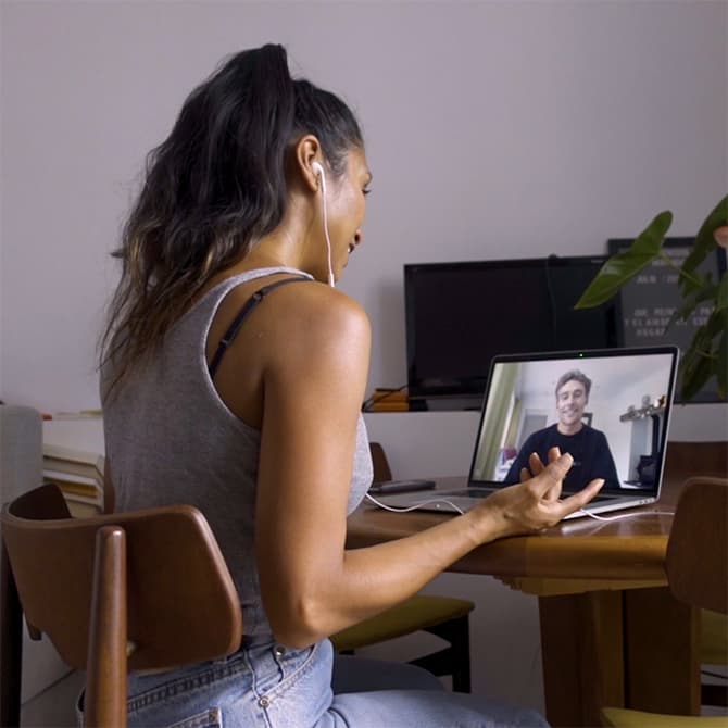 A member video-calling Matt, one of our founders, on her laptop