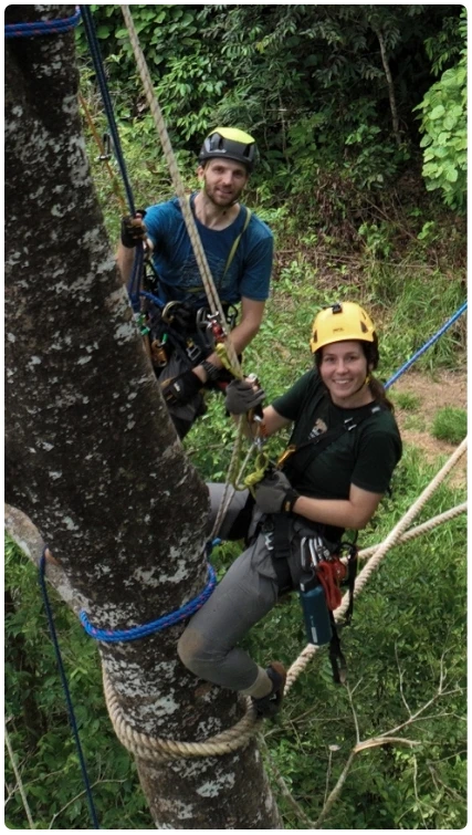 Adriana and Ollie climbing an Amazonian tree
